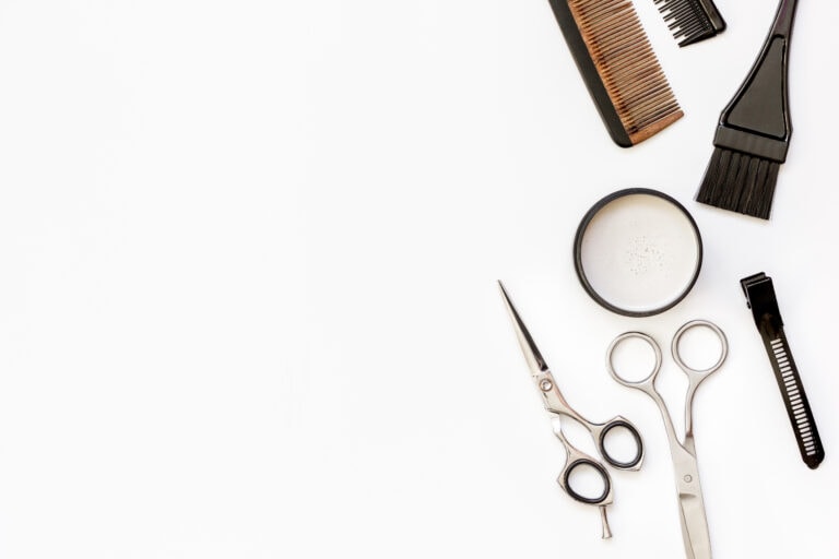 Graphic showing hairdressing scissors and combs