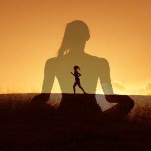 yoga position against a sunset