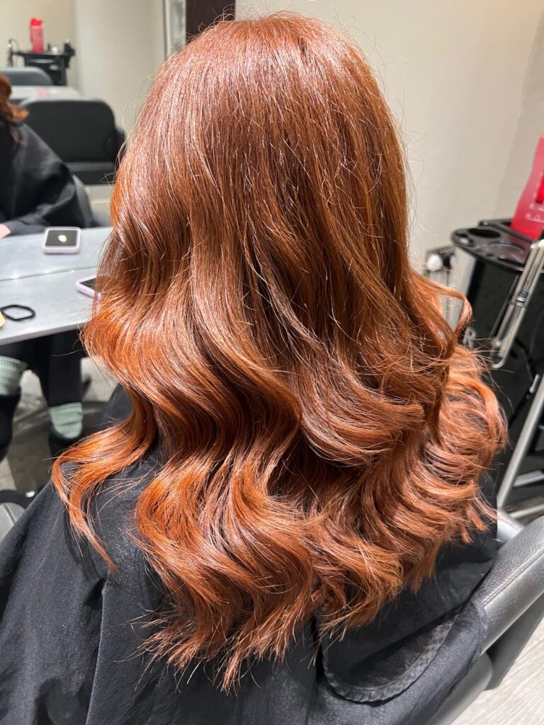 Long auburn hair thats wavy